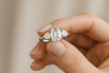 1.5Ct Emerald & Pear Three Stone Labgrown Diamond Engagement Ring - in hand