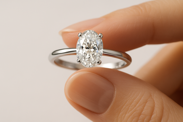1ct Oval Solitaire Natural Diamond Engagement Ring - in hand